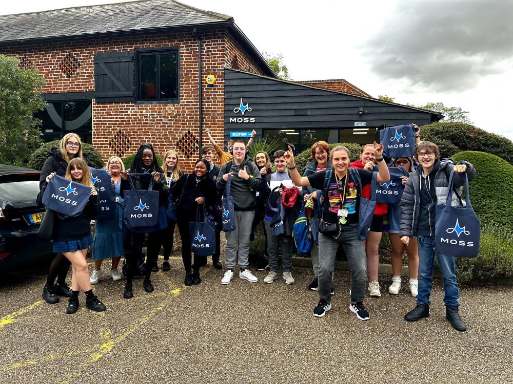 St Peters and Samuel Pepys students with Moss branded bags.